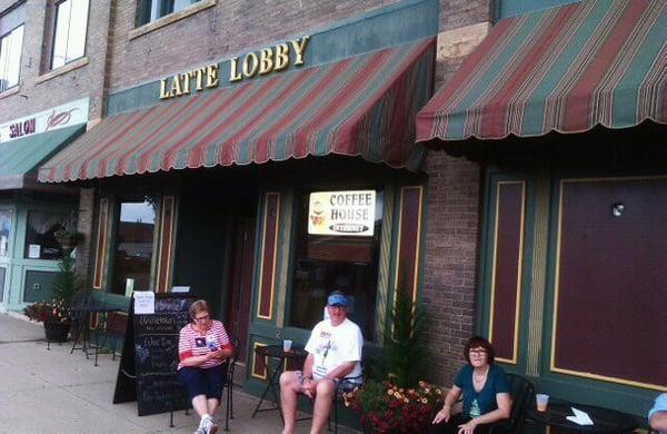 Front of building w/ local celebrities enjoying the town.