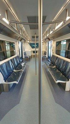 Interior of new shuttle - seats!  Terminals A & B older shuttles are standing only