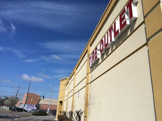 Tire outlet front face building.