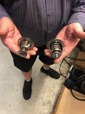 Bad thermostat Pep Boys used that did not work (left), Toyota thermostat (right).