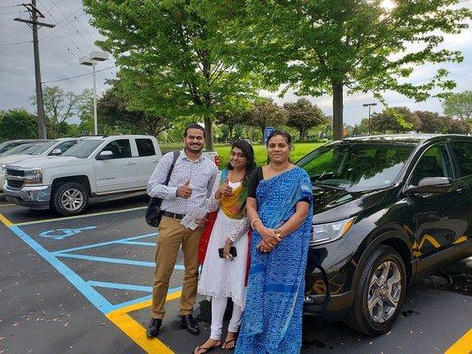 Suren Rajaram and family with new 2019 CR-V in Dark Olive Pearl!