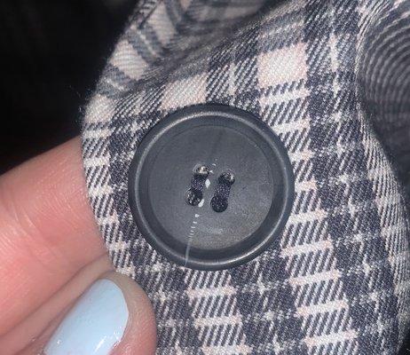 Yet another ruined button on my blazer. Scraped the finish right off!