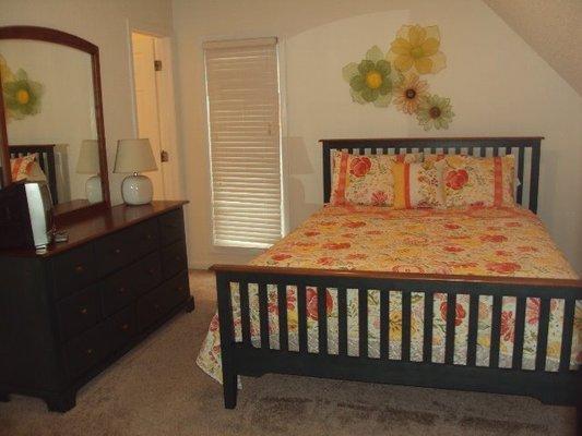 Master bedroom with queen size bed and private bath.