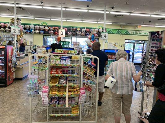 Long line, one register open. Talked to employees, she said she knows it's long line, but doing anything... what's up with this.