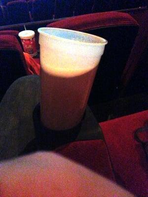 Large beer cups don't fit in theater cup holders. Don't commit a beer foul. Watch your cup.