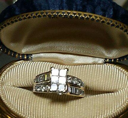 14K ring with diamonds.