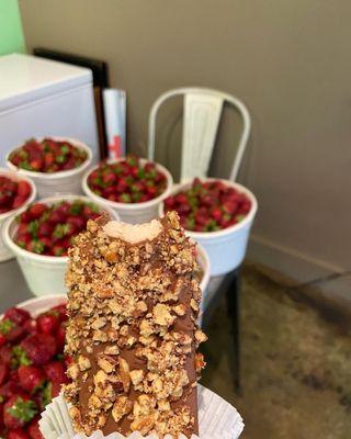 Strawberry cheesecake icecream, Dipped in milk chocolate and pecans!!