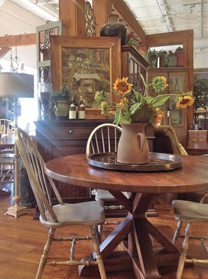 Showroom photo. Country style living at its' very best. The store has hand-planed wood floors and a Post & Beam construction.