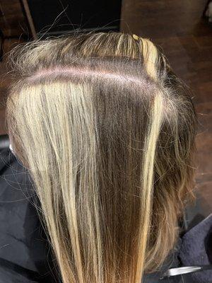 This is what I found after moving my hair from the left side of my head to the right side.  Done by Christine at Dino's Drive-In Barbershop.