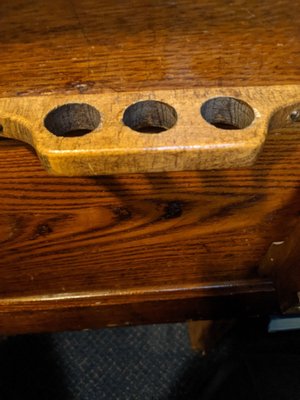 Alter wine cup holder on back of pew