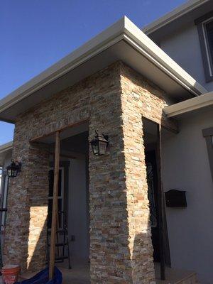 Entryway with Stone wall tiles