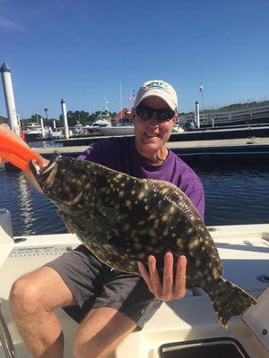 Big boy flounder, call to book your trip!!!!