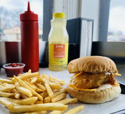 Motz's hand battered fish sandwich with french fries and lemonade.