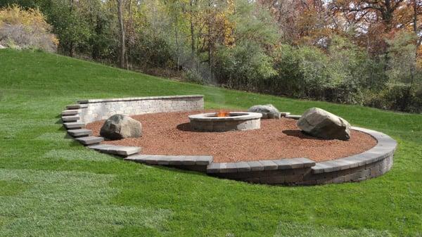 Natural fire pit area built into a slope.