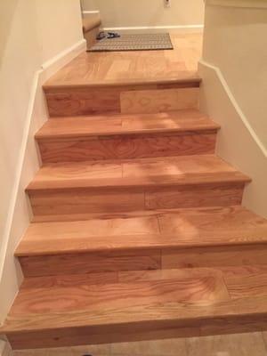 Carpeted stairs turned into wood.