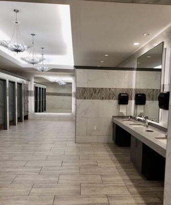 Spacious, clean & pretty restrooms. Heavy wood doors for complete privacy, no gaps! Hands free sinks & paper towels.