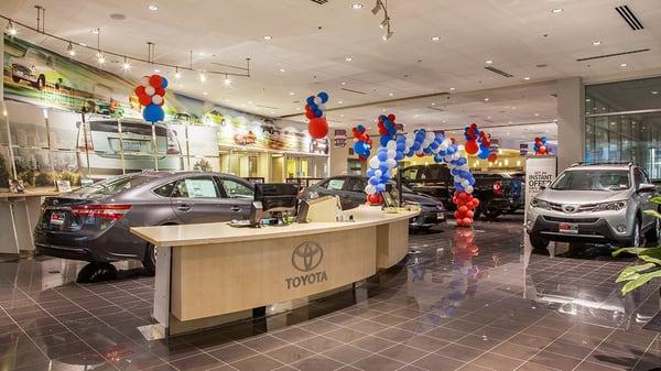 Front desk and spacious vehicle showroom