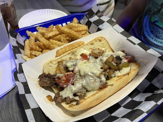 Philly Cheesesteak. Great price for a decent sandwich.