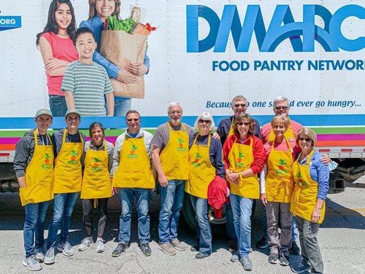 Group from WDMCC helping DMARC Food Pantry collect leftover produce from Des Moines Farmer's Market