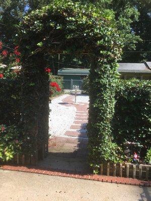 The garden path to the back exercise yard.