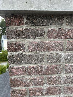 Cracked bricks were not replaced, mortar is awful