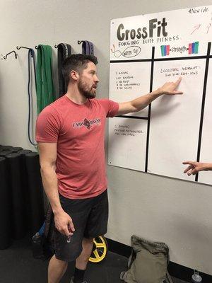 CrossFit Coach Matt setting up for a good strength session before the workout.