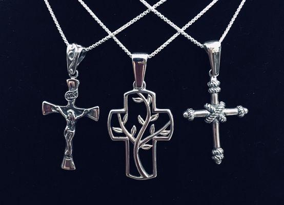 Sterling silver pendants, include chains. Crosses at $73.