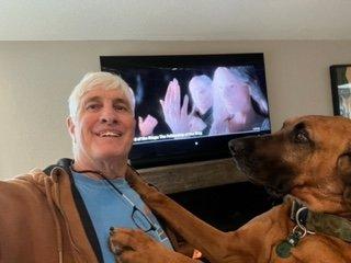 Another satisfied customer!  Loves long walks on the beach, snoozing by the fireplace, and watching Animal Planet!