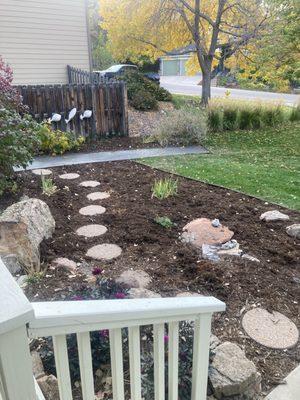 reduced the size of our garden, refreshed our path, added edging, and rerouted our drip line and sprinklers.