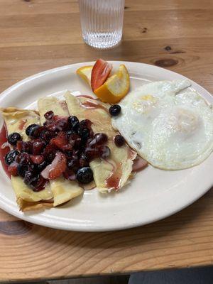 Wild berry crepes with Canadian bacon and eggs. Only in the breakfast secret menu.