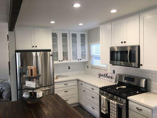 Full kitchen remodel with painting, plumbing, electrical work, cabinets and counter tops.