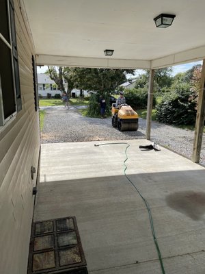 Driveway in progress...stone graded and covered with asphalt