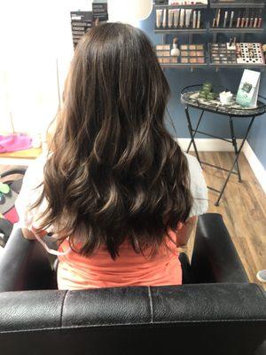 Beautiful long layer haircut ,and rich chocolate color.