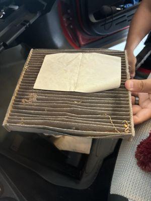 Cable Air Filter with a piece of paper that fell through glove box and blocked air flow.