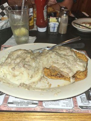 Chicken Fried Steak with sausage gravy over the mashed potatoes too.