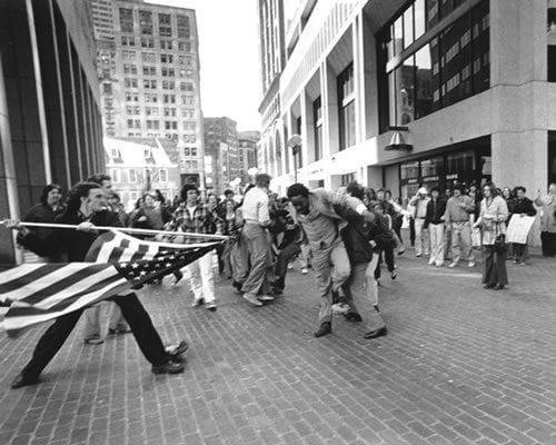 Landsmark being attacked on the Boston City Hall property.