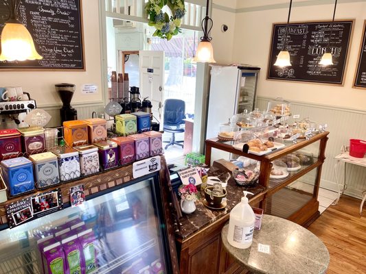 Right side of the counter with confections display and menus