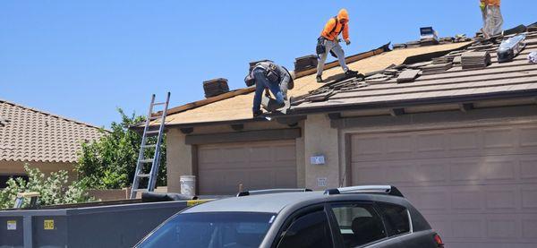 Working diligently to install front underlayment