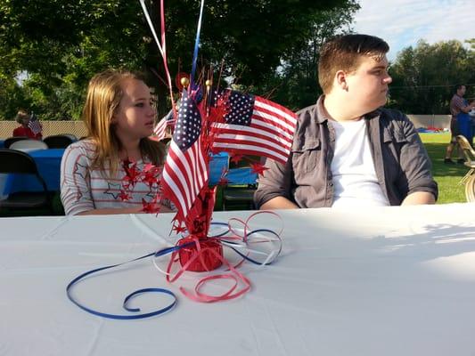 Lil brother and sister waiting for the 4th of July breakfast