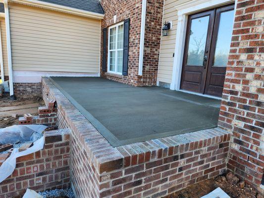 Porch was constructed, backfilled, and poured.