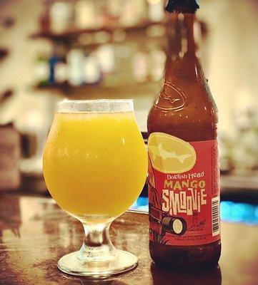 Dogfish head Mango Smoovie. This sour is brewed with loads of mango and tangerine, lactose, vanilla, a touch of rose water