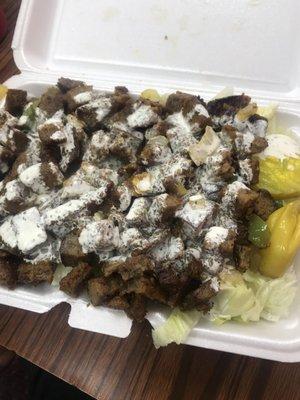 Gyro Meat and Yogurt Sauce over Salad ($10)