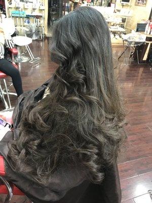 An exceptional long layered hair cut and style.