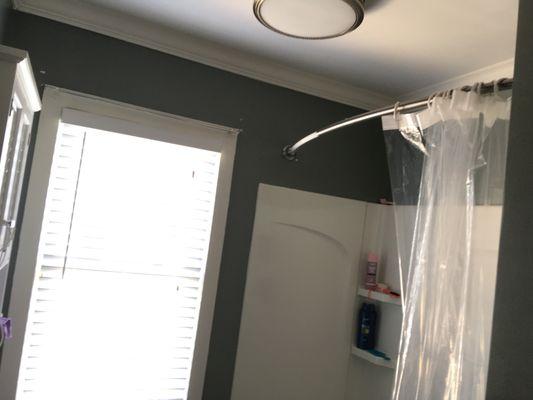 Replaced shower curtain and window rods