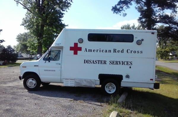 American Red Cross emergency response vehicle (ERV) parked in courthouse parking lot.