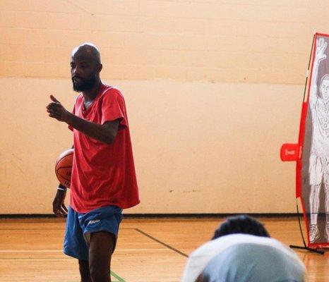 Coach 20 talking about attacking while using the proper angles to the basket.