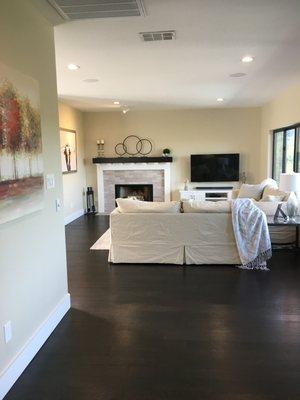 custom fireplace, new windows, opened floor plan, recessed lighting