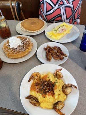 Shrimp 'n Grits, Seafood Omelet, pancakes, Pecan Waffle and side of bacon