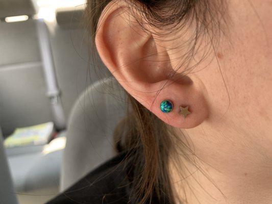 2nd lobe done by Bryan with a peacock opal earring.