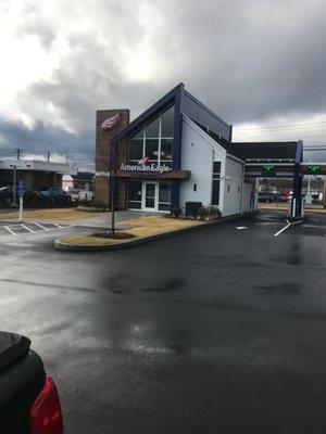 Even on a dreary windy February day, this new branch office of the AEFCU stands out.